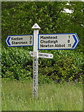 SX9481 : The signpost at Black Forest Lodge by Ian S