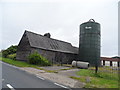 Barn and storage tank