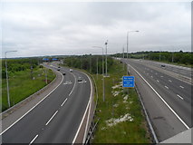 TQ4799 : M25 and M11 interchange seen from Hobbs Cross Road (Bridge) by Bikeboy