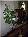 ST9515 : St Laurence, Farnham: floral display by Basher Eyre