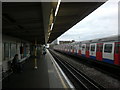 View along the Hammersmith and City and Circle line tracks towards Wood Lane station from Shepherd