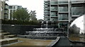 View of a waterfall in the Woodberry Down Estate from the path