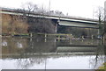 TQ1678 : Grand Union Canal, weir & M4 by N Chadwick