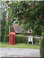 ST9408 : Tarrant Monkton: phone box and noticeboard by Chris Downer