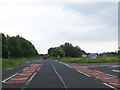 The crossroads of the A26 (Frosses Road) and the B64 (Clough/Glarryford Road)