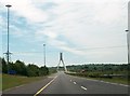 O0575 : Power-lines crossing the M1 just north of the Mary McAleese Boyne Valley Bridge. by Eric Jones