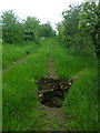 Farm track with broken culvert, approaching Paynsley