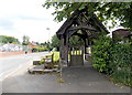 Lych gate, bench and church name board, Eardisley