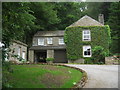 Thiernswood Cottage seen from a public bridleway