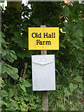 TM3684 : Old Hall Farm sign by Geographer