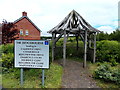 SO0560 : Large name sign and a wooden structure, Llandrindod Wells by Jaggery