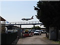 TQ0476 : Airliner, Personal Rapid Transit, maintenance yard in Longford by David Hawgood