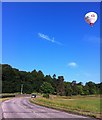 A Hot Air Balloon Passes Keir Mains Wood