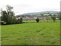 View across farmland towards the development on Old Railway Close, Leitrim