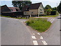 Road junction near Washingditch Green complete with grass triangle