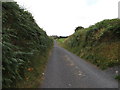 The lower, descending section of Glenloughan Road cutting through a drumlin