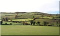 View from the B8 across a minor valley to the summit of Craigalusta