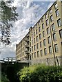 Britannia Mill beside Huddersfield Narrow Canal Lock 6E