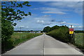 Concrete surfaced road, leading to a depot