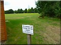 Moulsford recreation ground with a notice by the pavilion