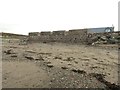 NX0883 : Ruins on the beach by Ann Cook