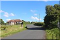 Old Largs Road climbs through Murdieston