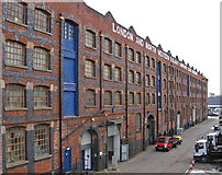 SJ8890 : Heaton Norris - LNWR warehouse - west side by Dave Bevis