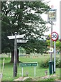 Fingerpost and assorted signs, Farleigh Green