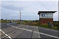 Signal box beside level crossing