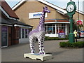 Giraffe sculpture at Freeport Braintree