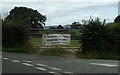 Lane junction with anti windfarm banner