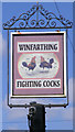 Fighting Cocks Public House sign