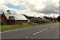 Houses alongside the A483 in Llanddewi Ystradenni, Powys