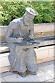 Statue of William Tyndale in New Millennium Square