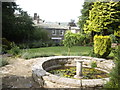 NY9923 : Lily pond, Egglestone Hall Gardens by Stanley Howe