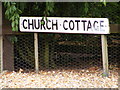 TG2705 : Church Cottage sign by Geographer
