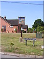 TG2902 : Yelverton Village sign by Geographer