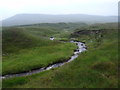 NN4762 : Allt Dubh Garbh flowing towards Allt Coire a' Ghiubhais near Loch Ericht by ian shiell