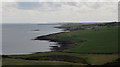 NU2521 : View south from the gatehouse of Dunstanburgh Castle by Graham Robson