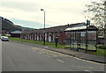 Row of bungalows and bus shelter in Peacehaven, Tredegar