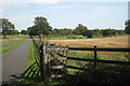 SP1168 : A glimpse of Heath Farm from Ullenhall Lane by Robin Stott