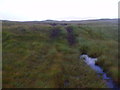 NN4763 : ATV track on steep peat bank west of Loch Ericht by ian shiell