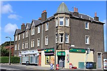 NT2769 : Shops on Lasswade Road, Edinburgh by Leslie Barrie