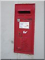 Post box in a wall, Craster