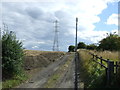 Farm track and telecommunications mast beside the M1