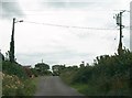 N0429 : Power lines and cylindrical transformer at Clonfinlough by Eric Jones
