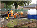 Fettling the rails, Queens Walk