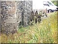 North wall of old mill, with mill wheels