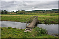 SD2388 : Footbridge over The Kirkby Pool by Tom Richardson