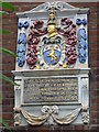 Plaque over the entrance to the Smyth Almshouses